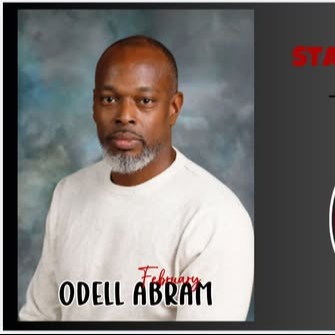 photo of male counselor in white sweater