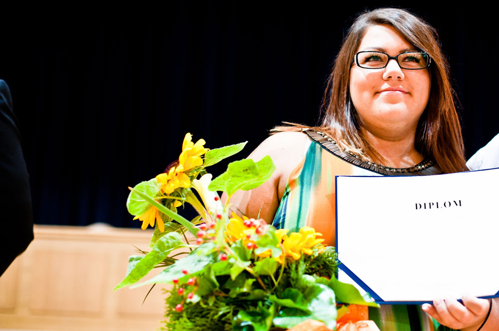 woman receiving a diploma