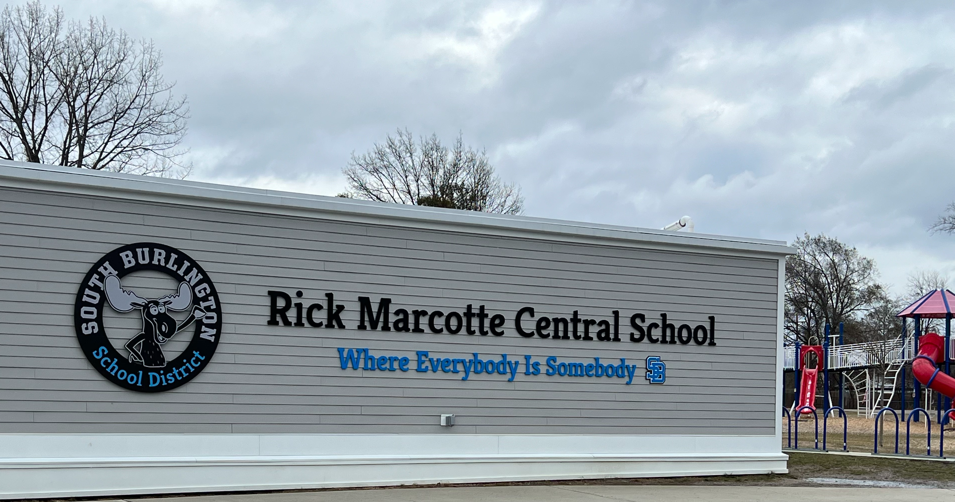 RMCS School sign, Where Everybody is Somebody.