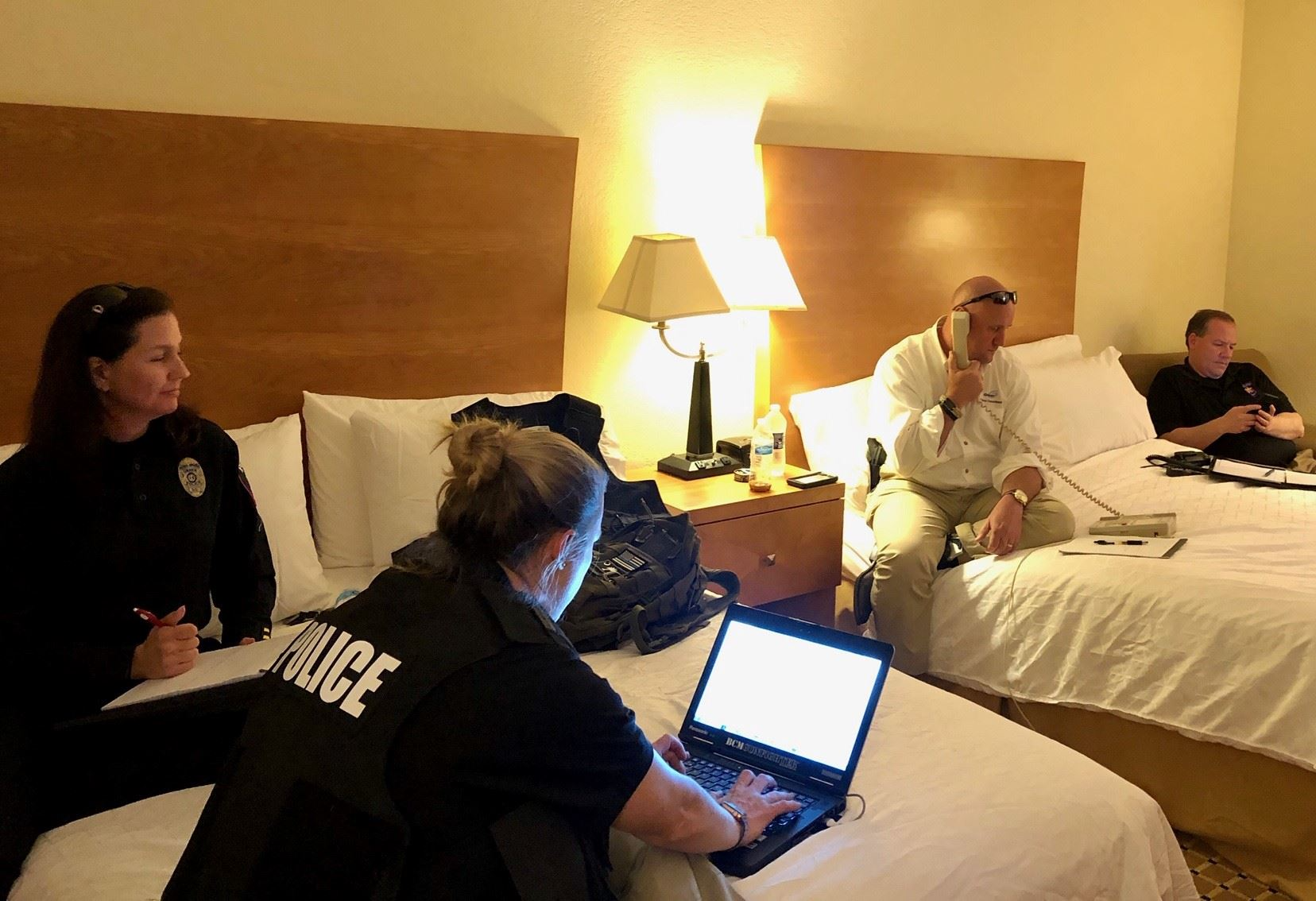 Crisis Negotiation Team in a hotel room