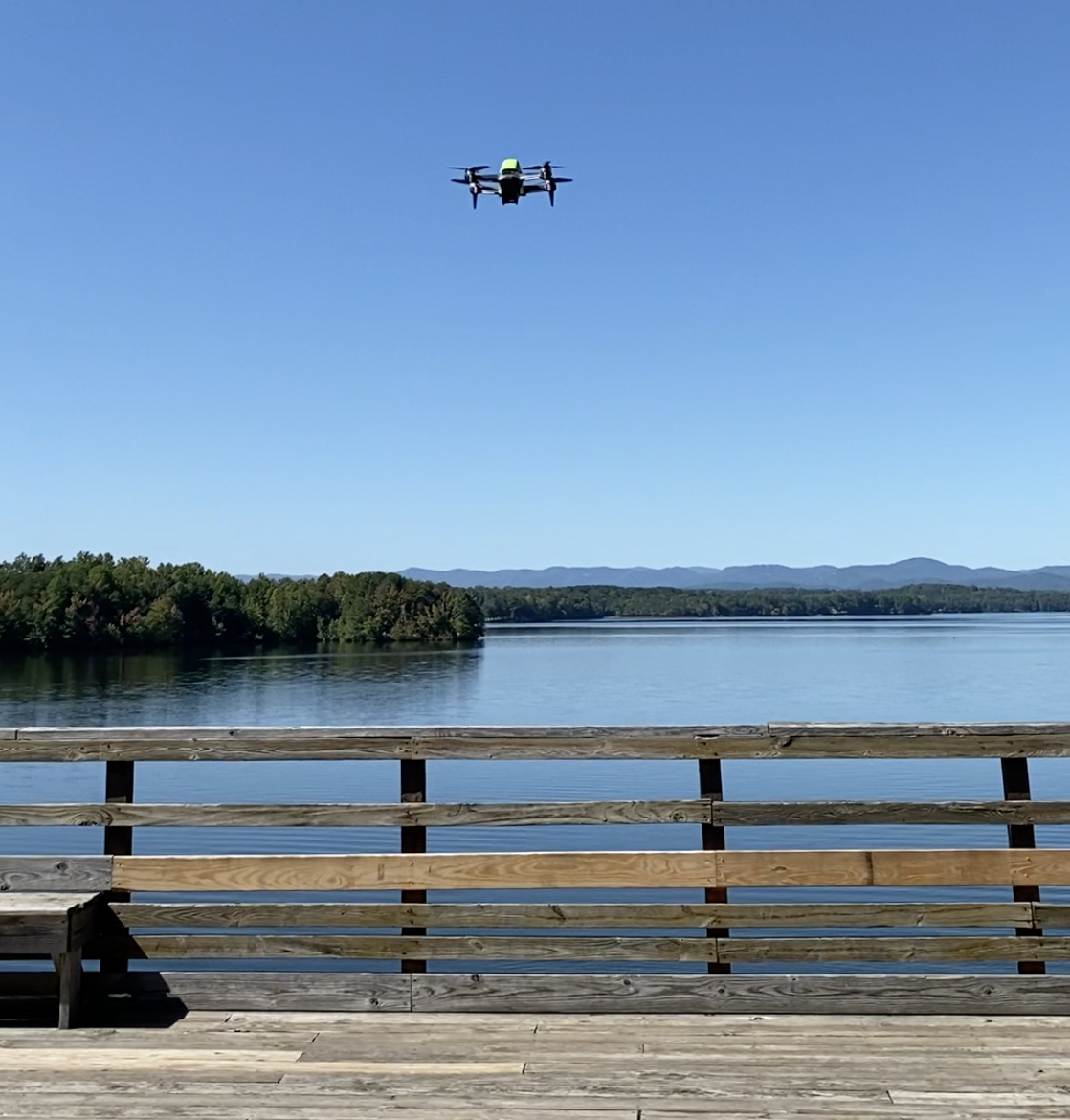 drone over water and mountains