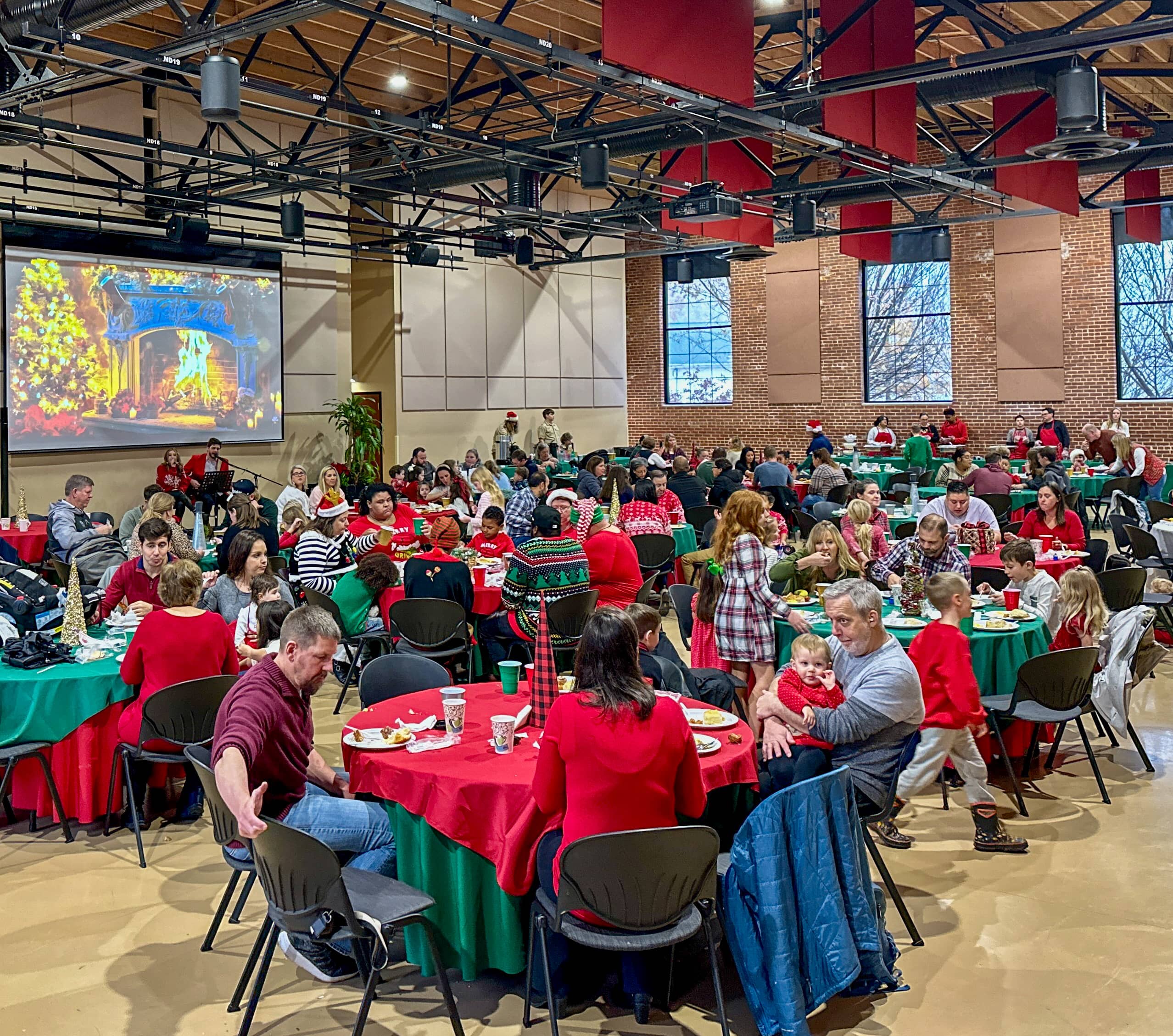 breakfast with santa wide shot of auditorium showing families