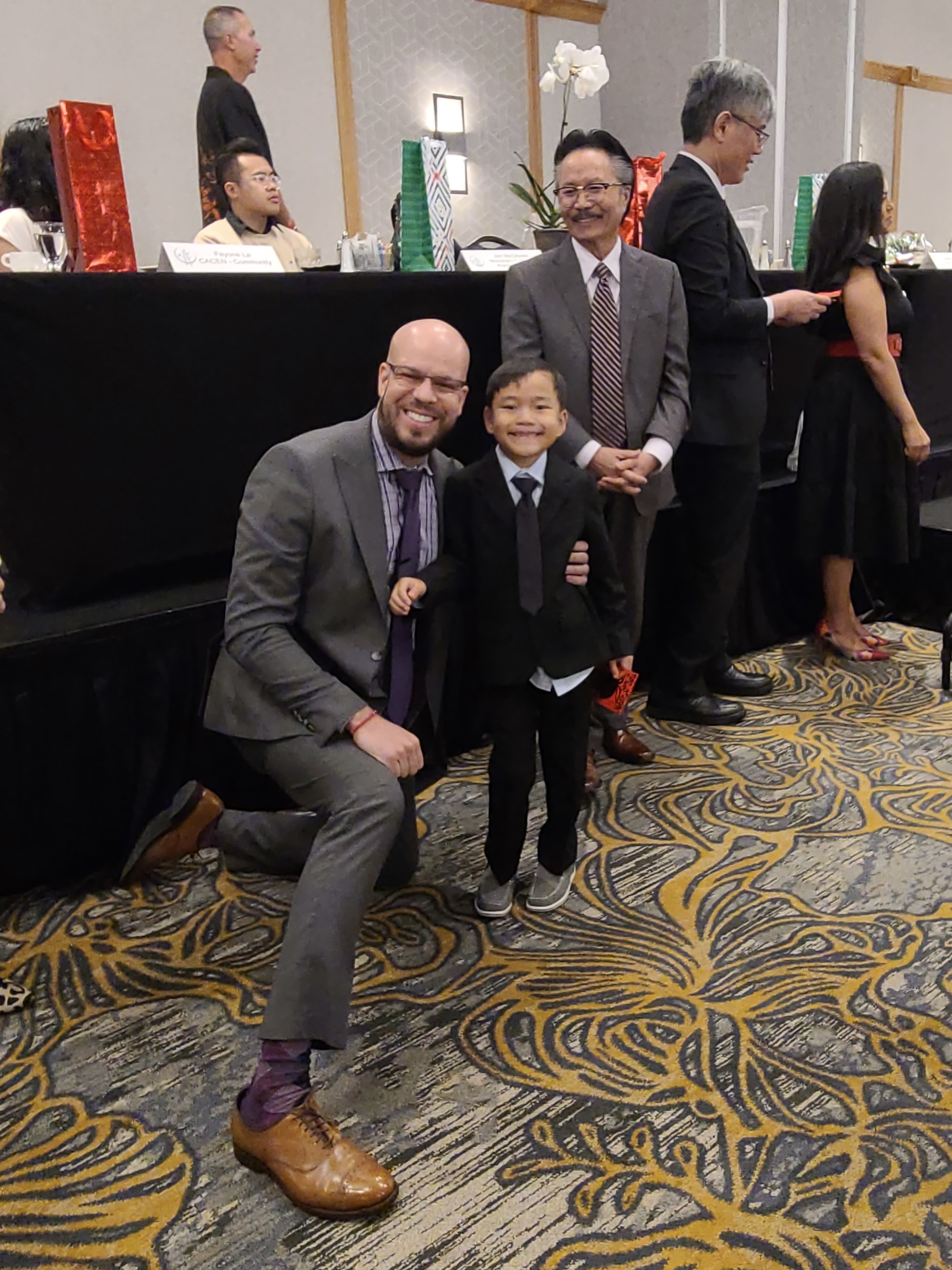 Dr. Marrero posing with student