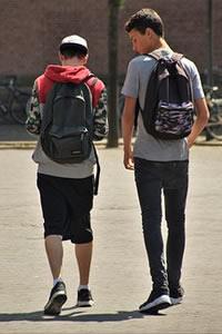 two kids walking