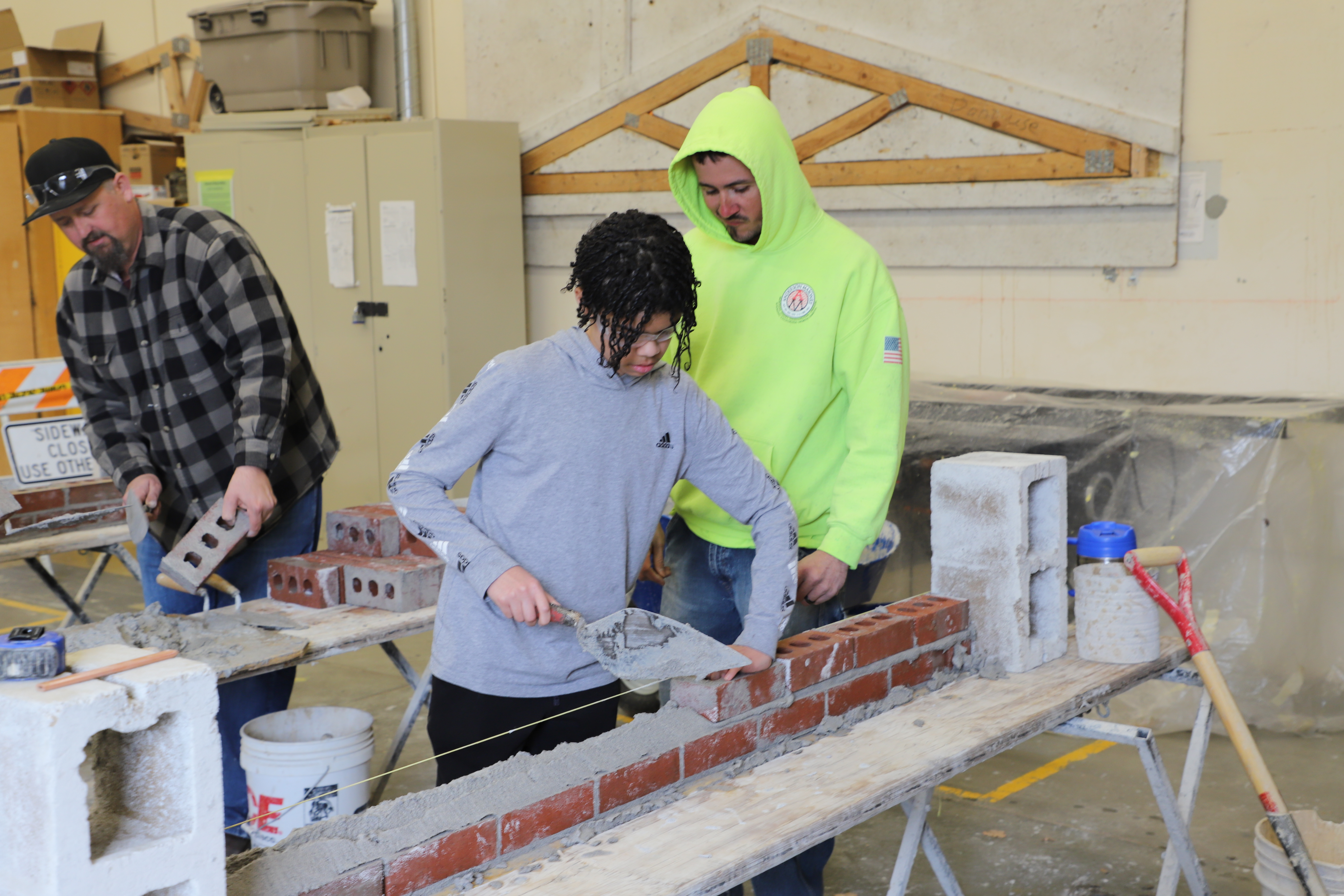 Kid laying bricks