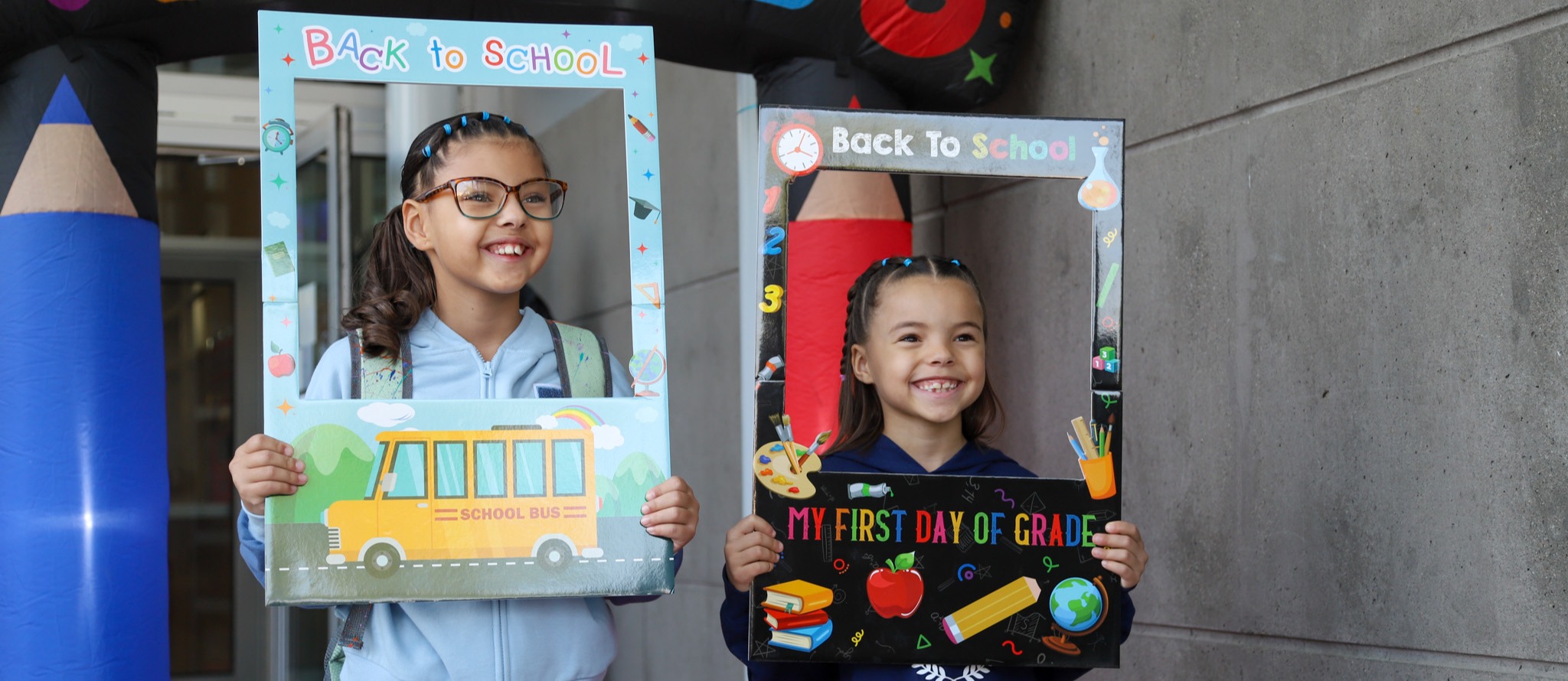 Kids smiling on the first day of school