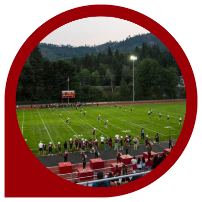 Peshatin Football Field with players on the field