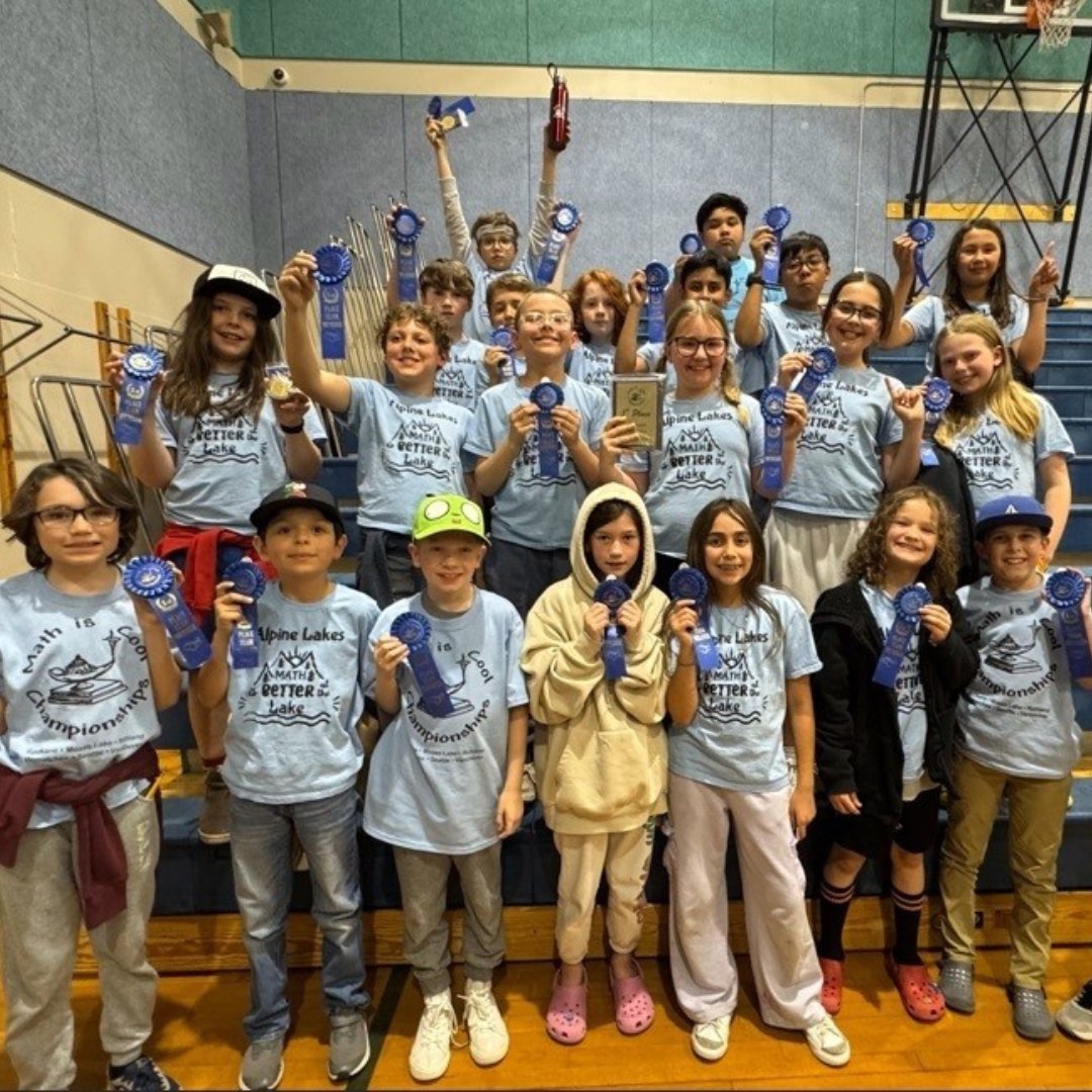 A group of elementary school students with their awards from Math is Cool competition