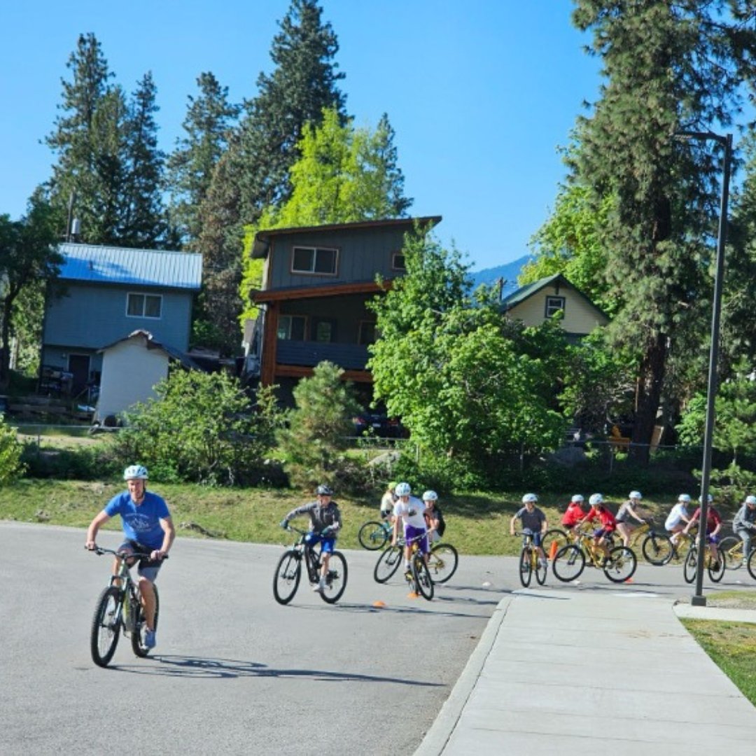 Students biking around a neighborhood