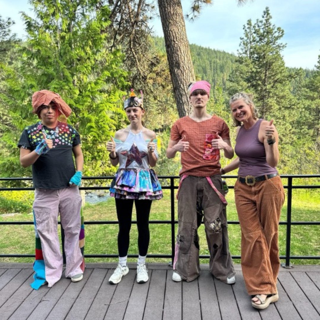 Student posing in outfits after Wenatchee River Institute's Trashion Show