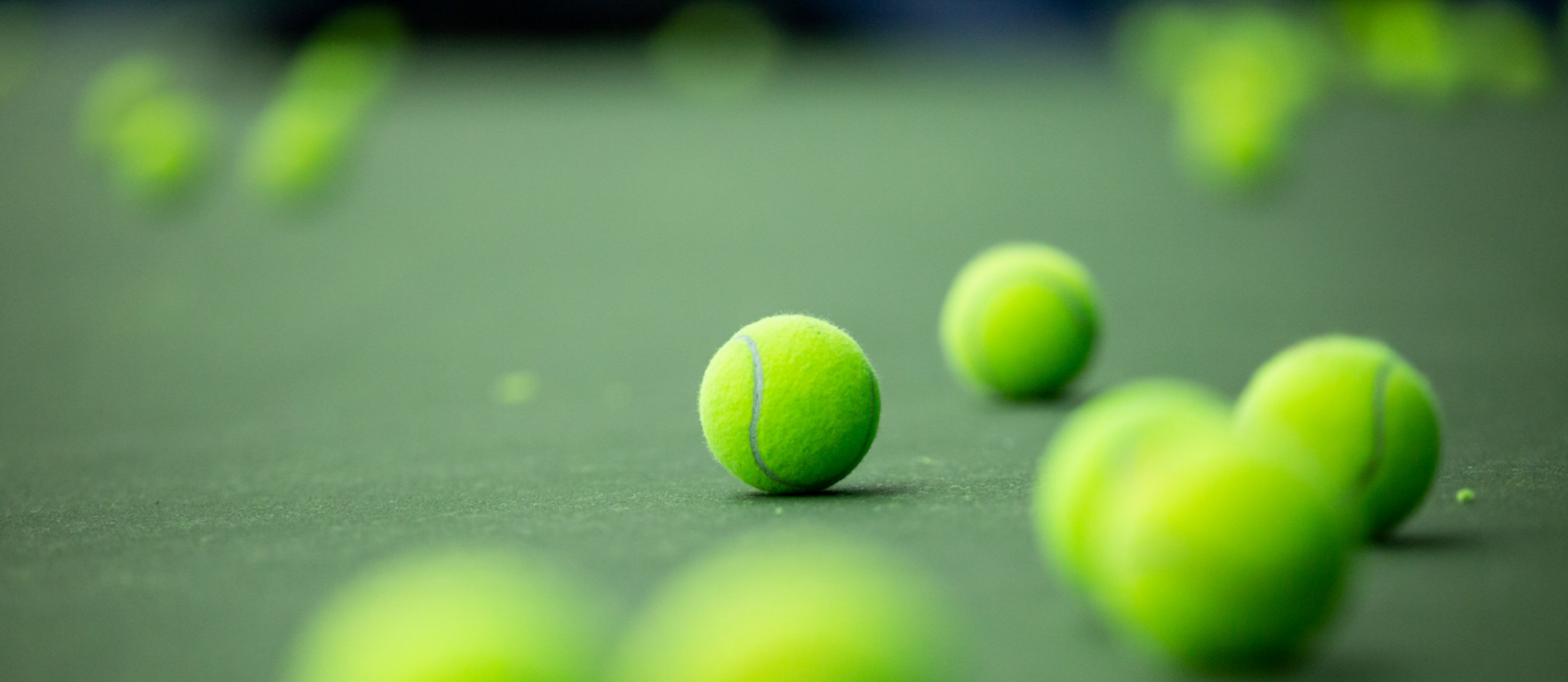 tennis balls on court