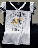 A design for a shirt with the school's logo.