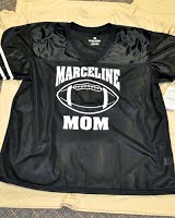 A design with the school's logo, with the words "Marceline Mom"