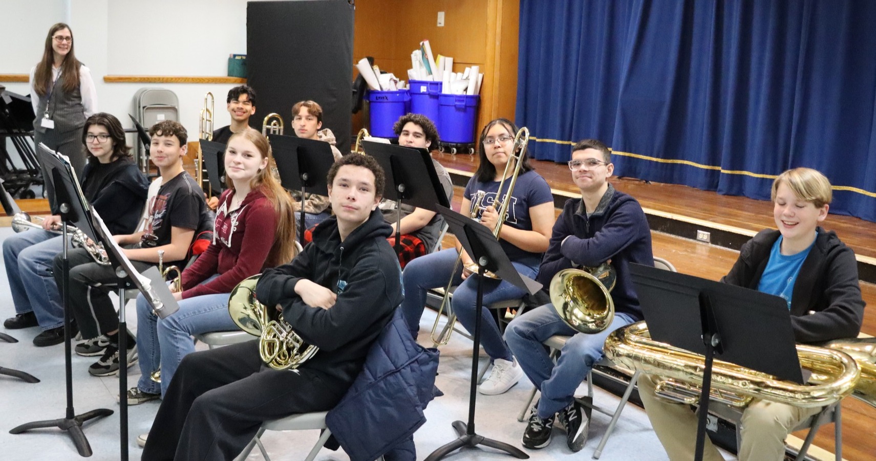 Band students holding instruments