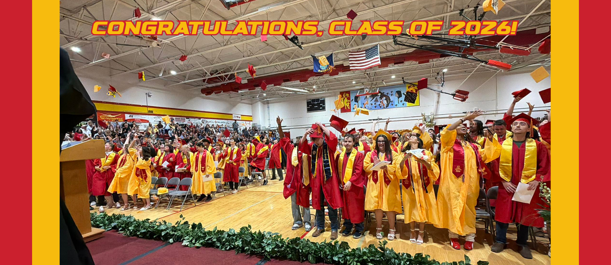 Photo of the traditional cap toss following the 2026 graduation ceremony