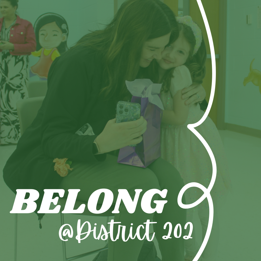belong @ district 202, image of teacher hugging a student