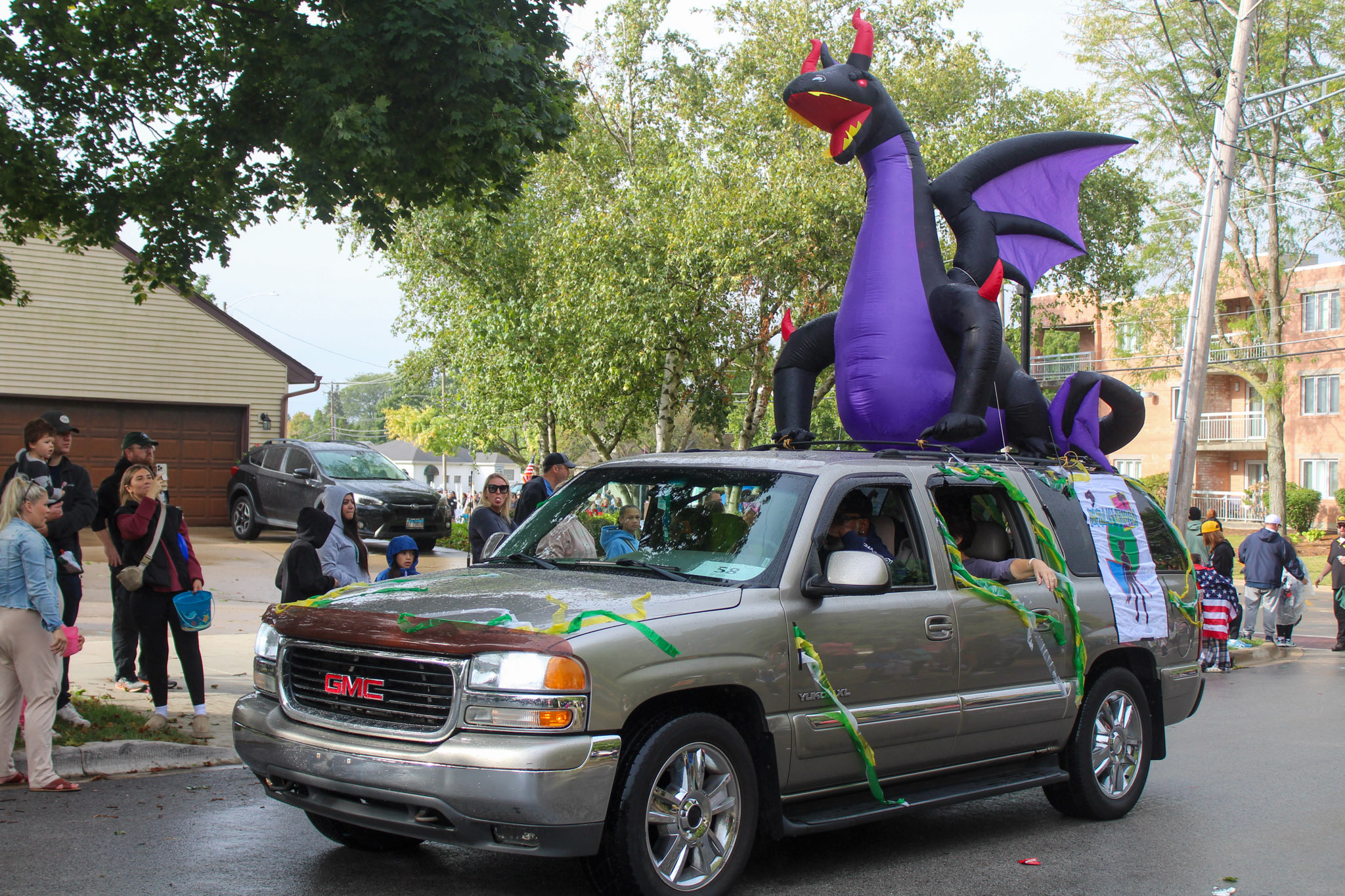 Plainfield High School-Central Campus fall play float with inflatable dragon on top of truck 