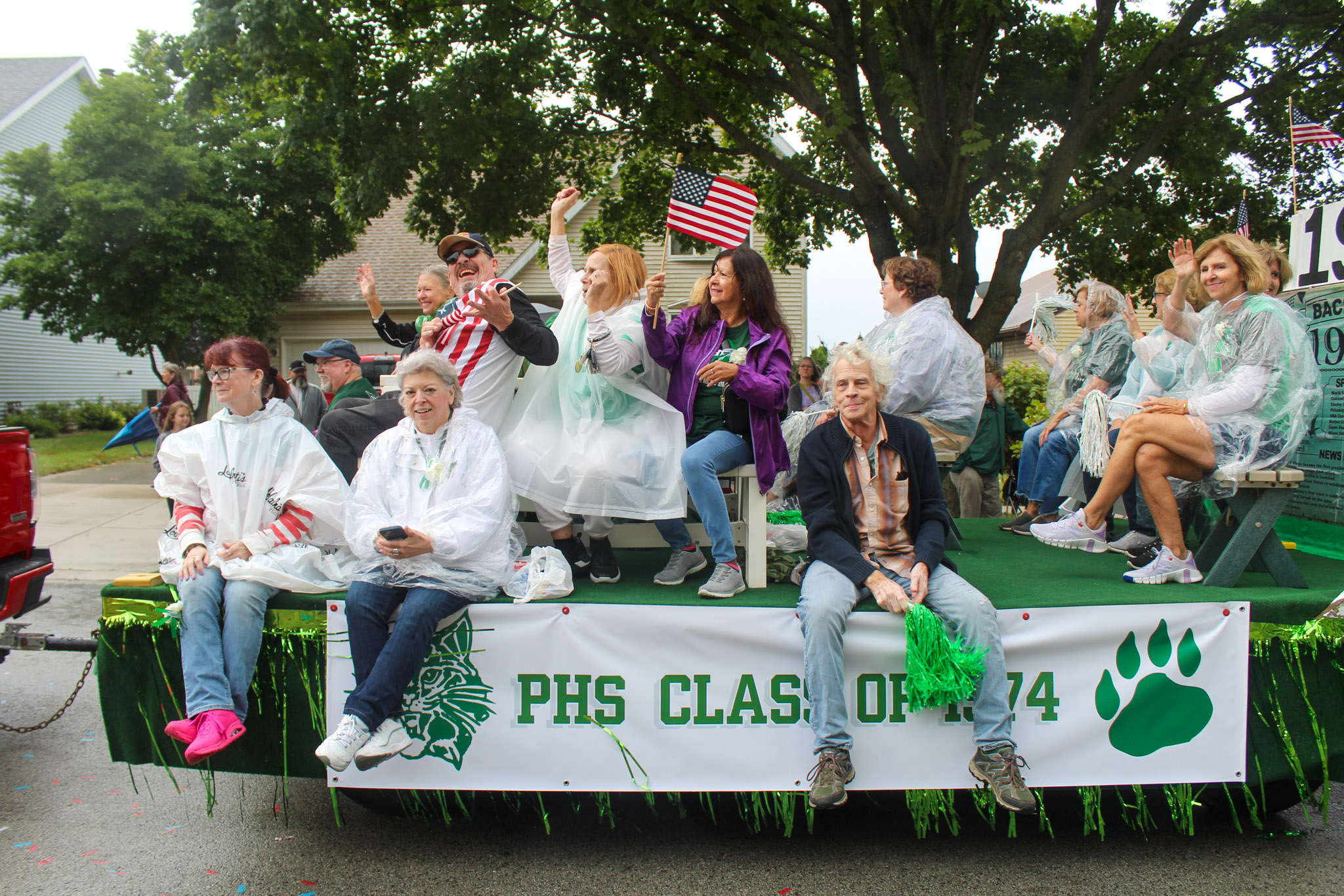 Class of 1974 float with riders 