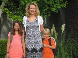 A photo of Brianna, Cody, & Mrs. Maguire.