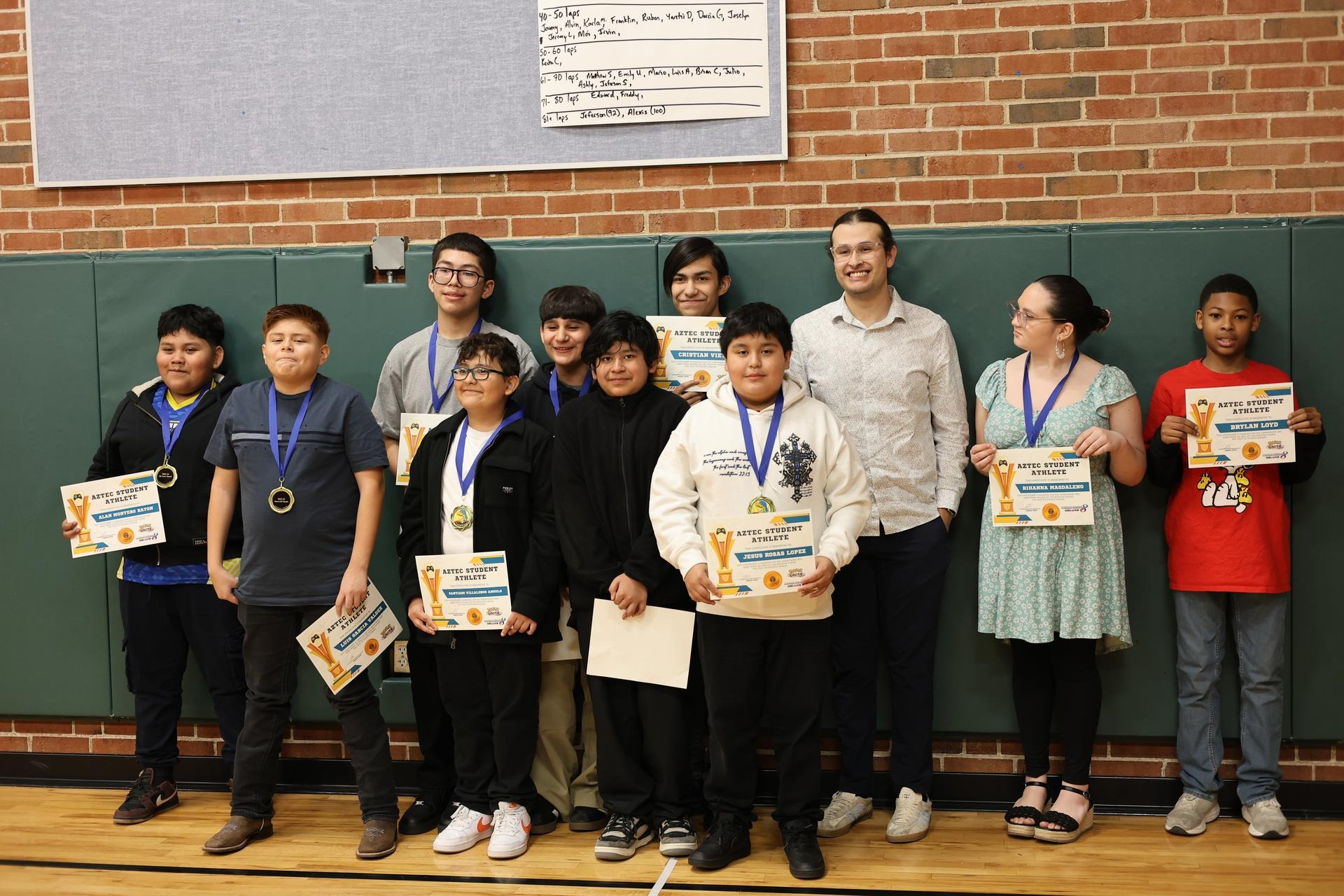 Group of students at sports awards banquet 