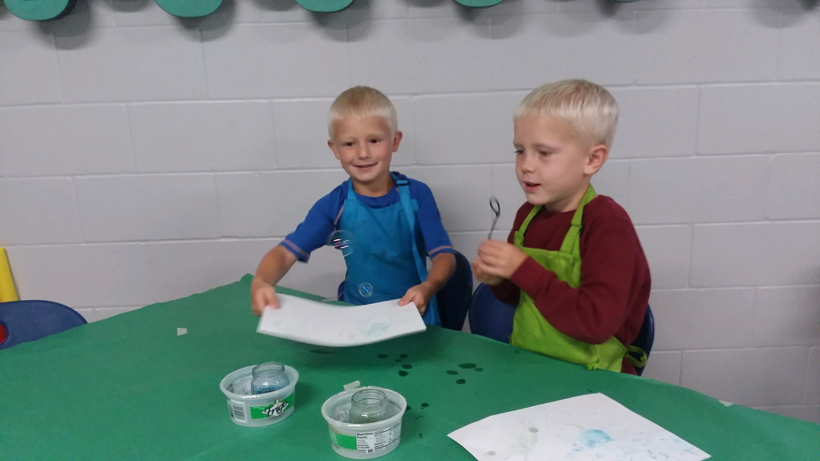 Kindergarten students learned how to paint using bubbles.  What a fun class!