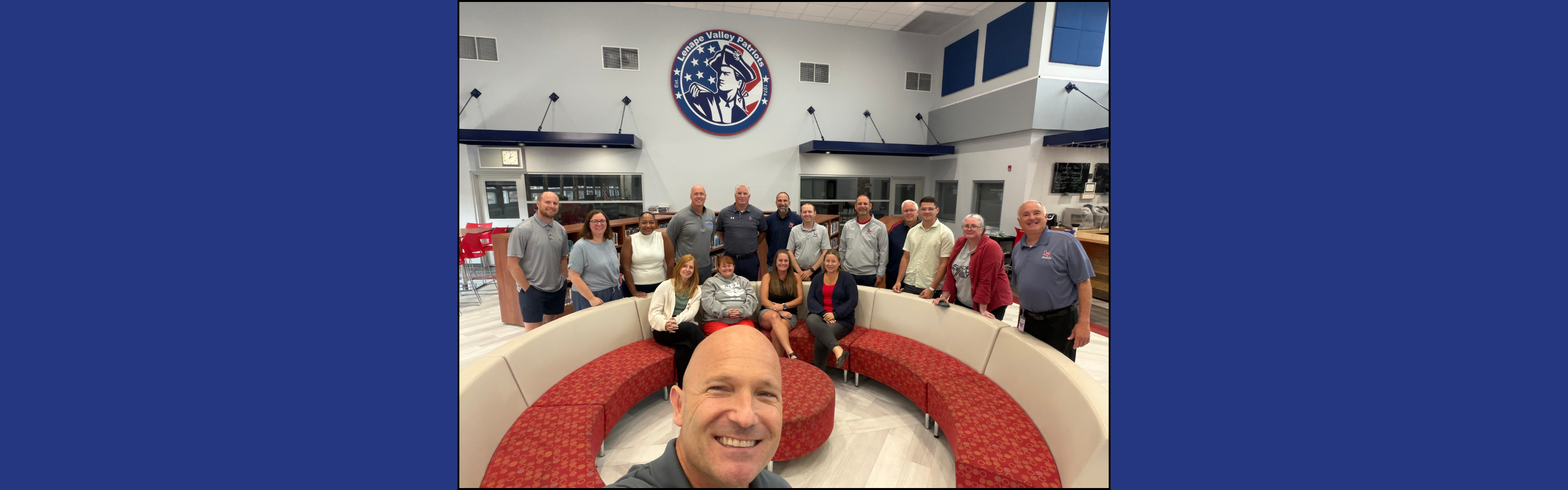 Group photo of educators from Lenape Valley, Byram, Netcong, and Stanhope gathered in the Lenape Valley media center during the Annual Leadership Retreat.