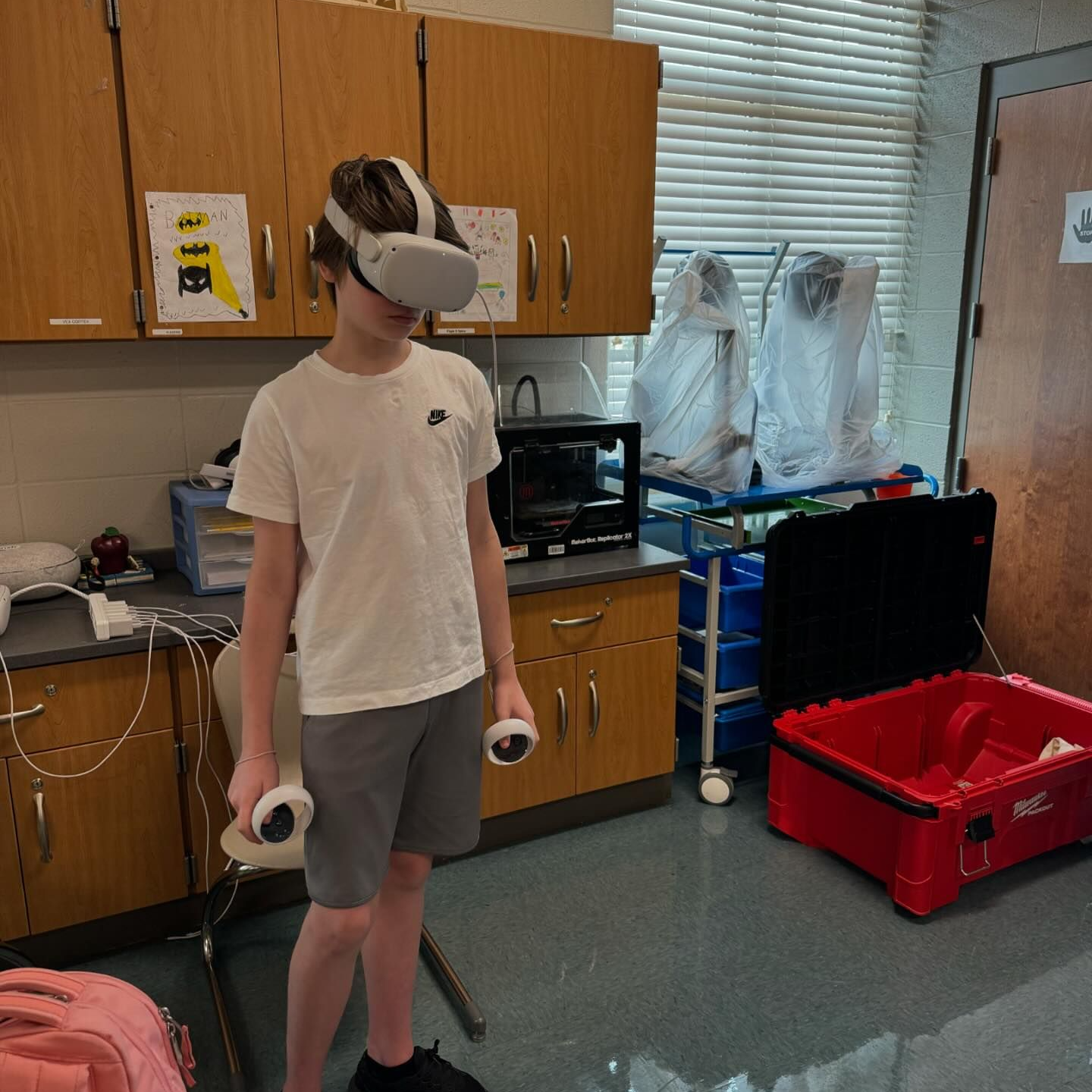 virtual reality free play with headset and boy in class