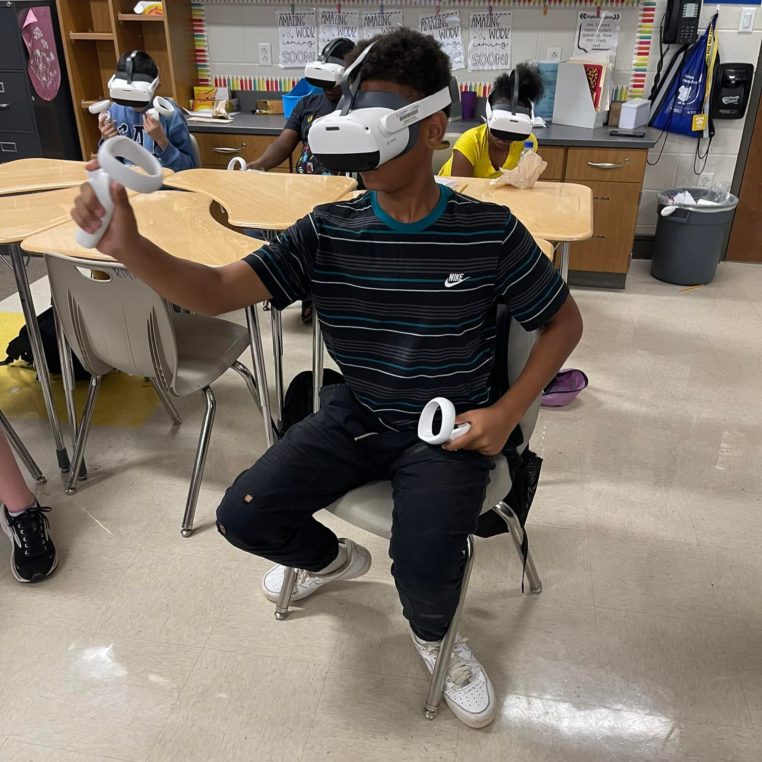 virtual reality with boy in classroom