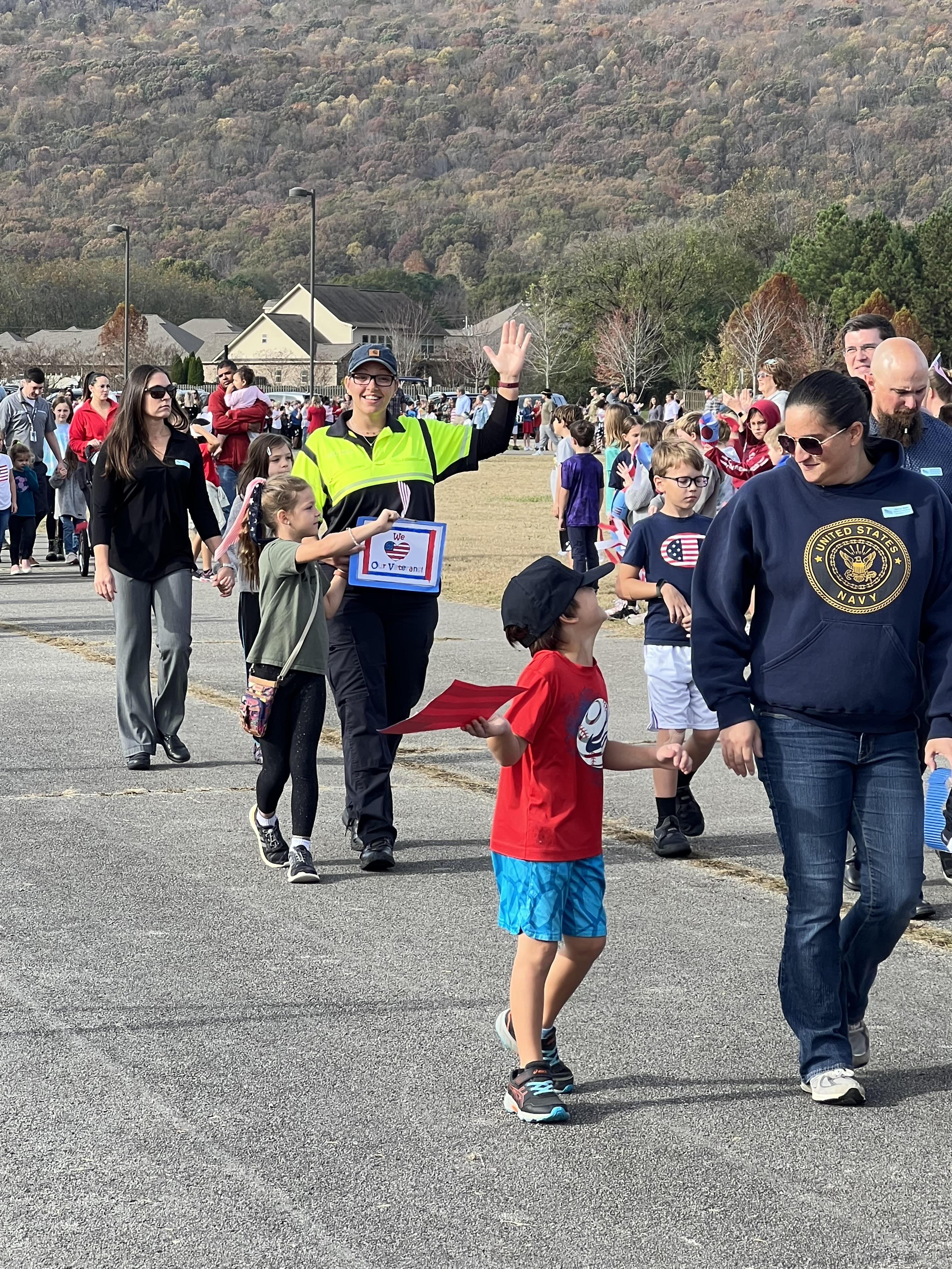 Families walking in parade