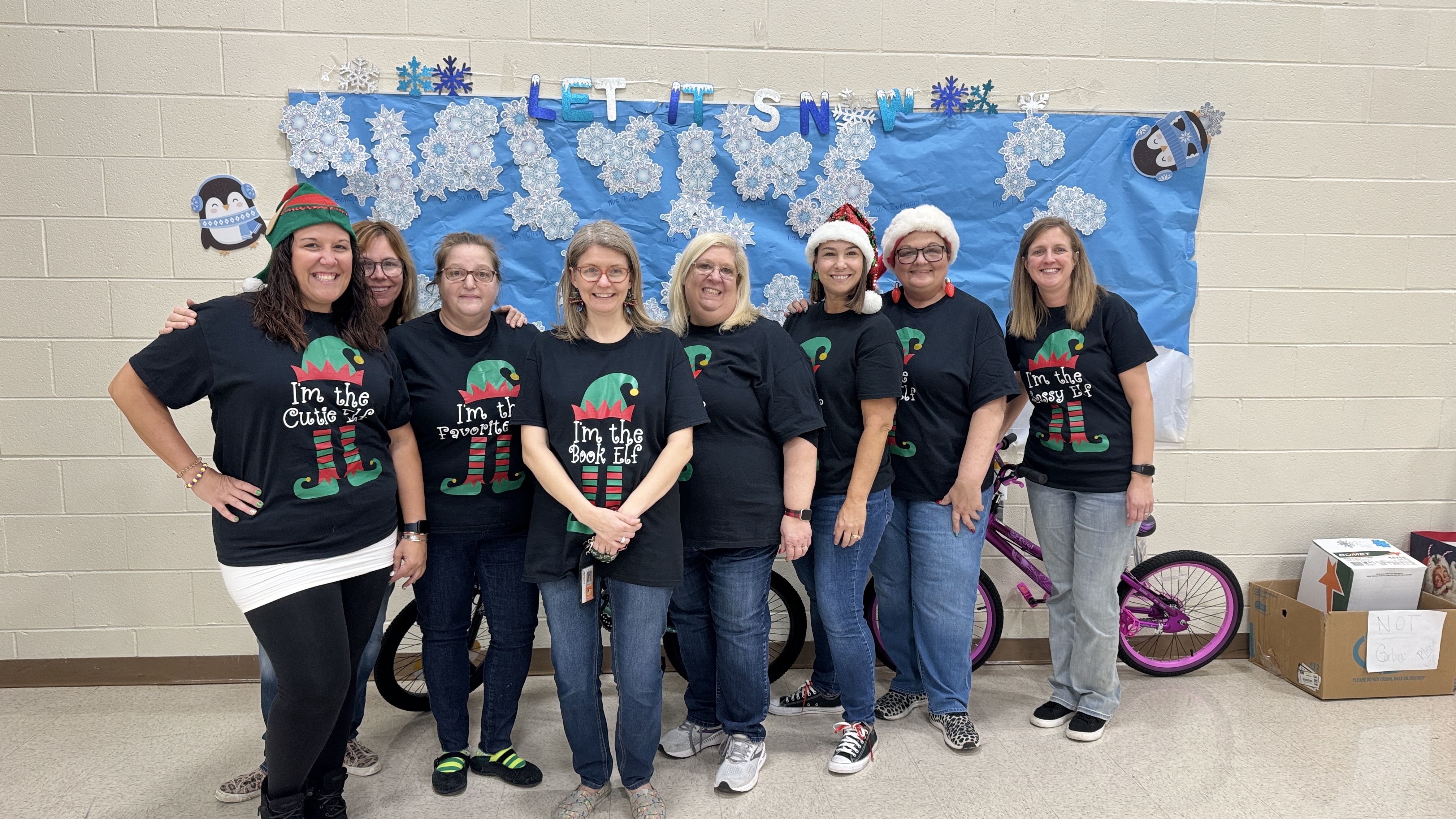 Season of Giving - Teachers posing for a picture.
