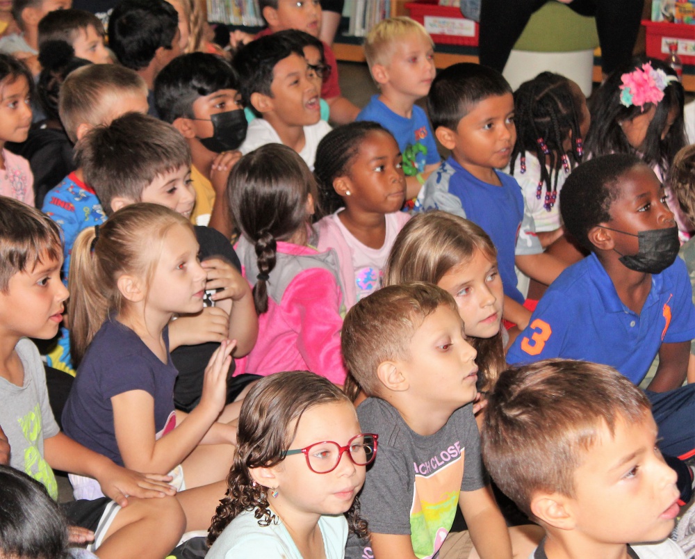 students together in a room watching demonstration