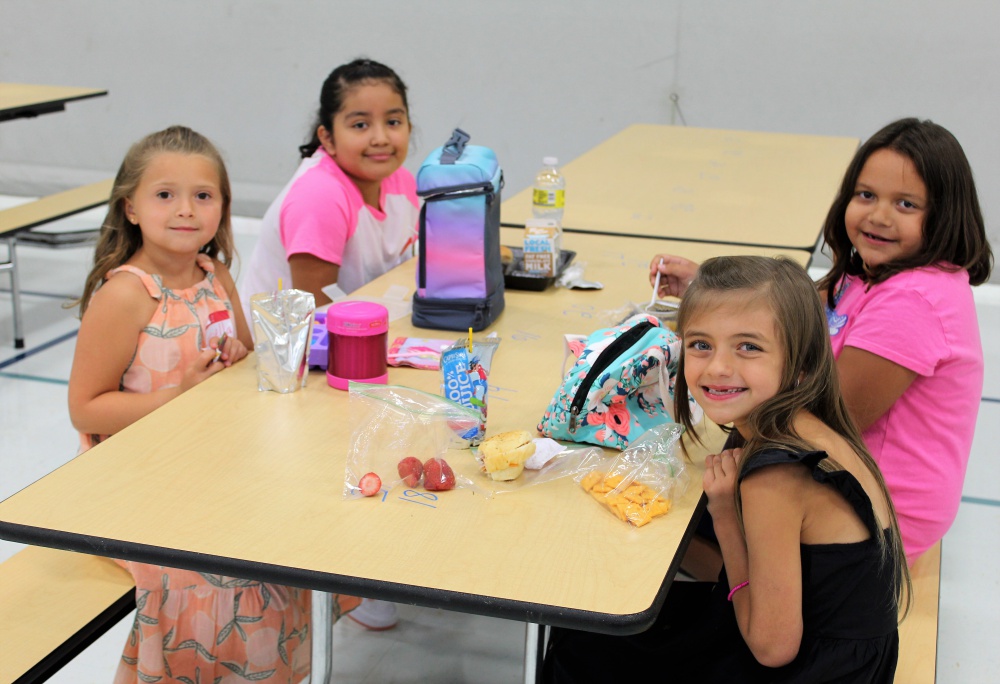 students smiling while on a class