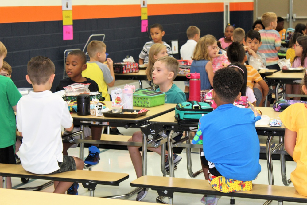 students smiling while on a class