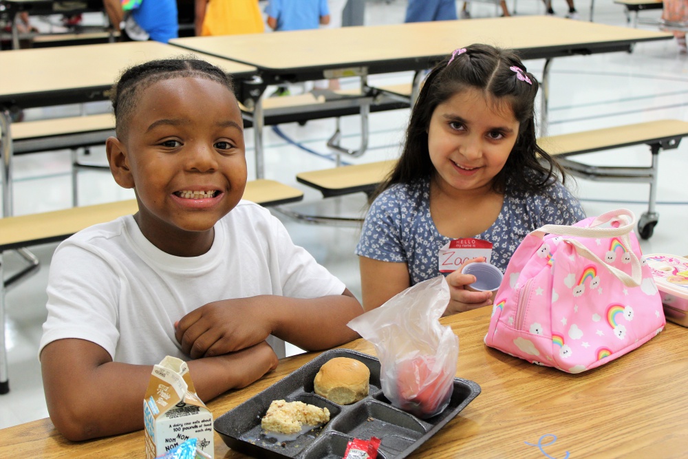 students smiling while on a class