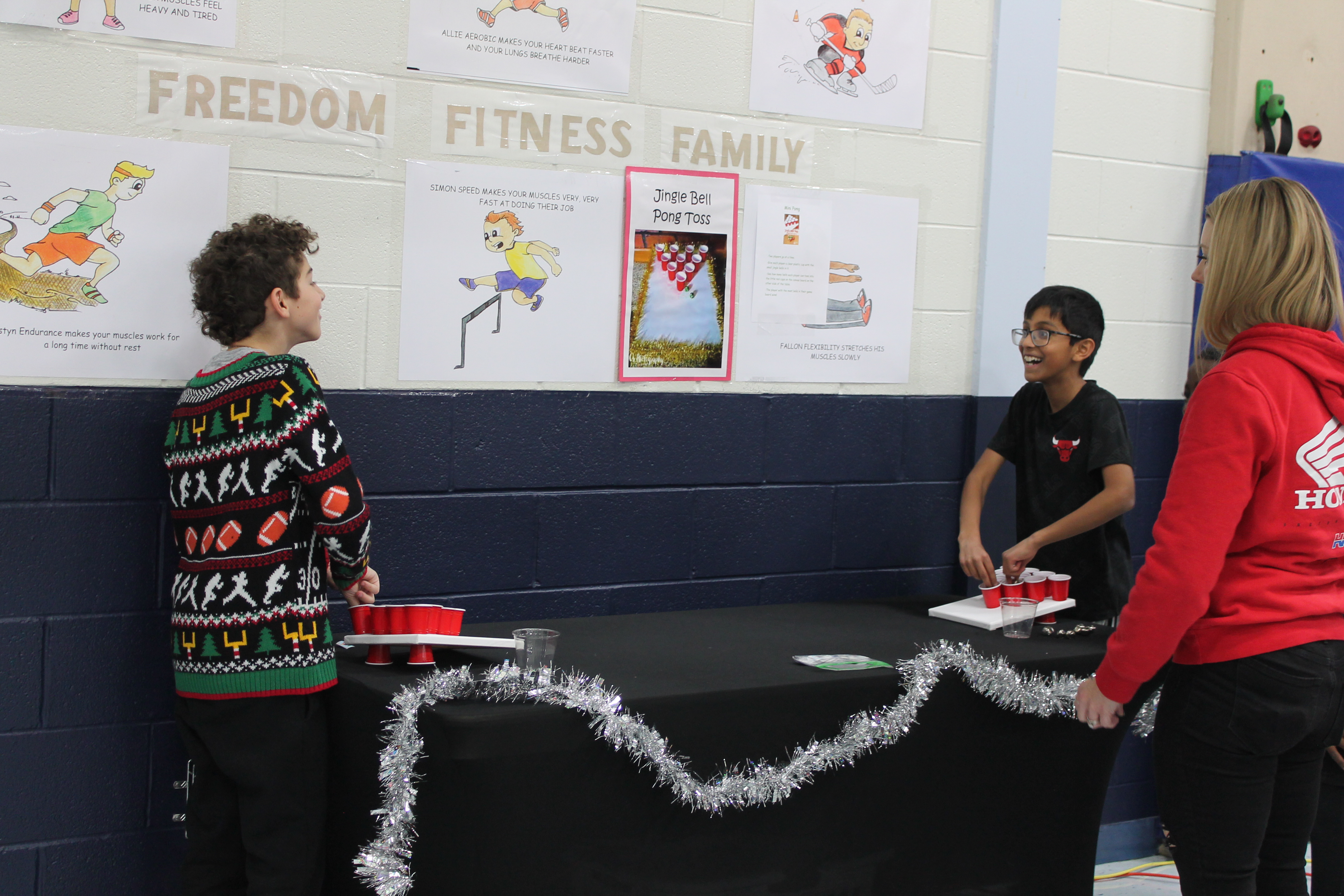 Students enjoy holiday games and crafts at winter-themed parties.