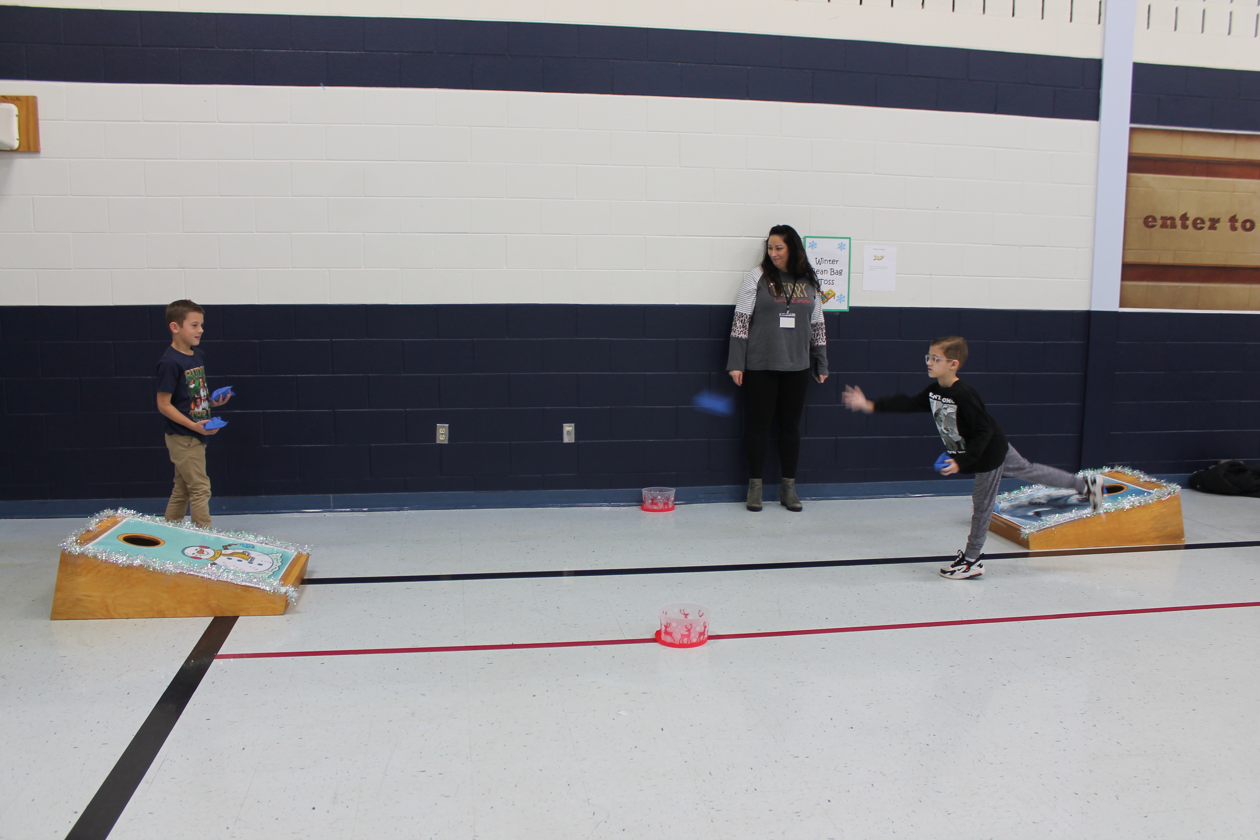 Students enjoy holiday games and crafts at winter-themed parties.