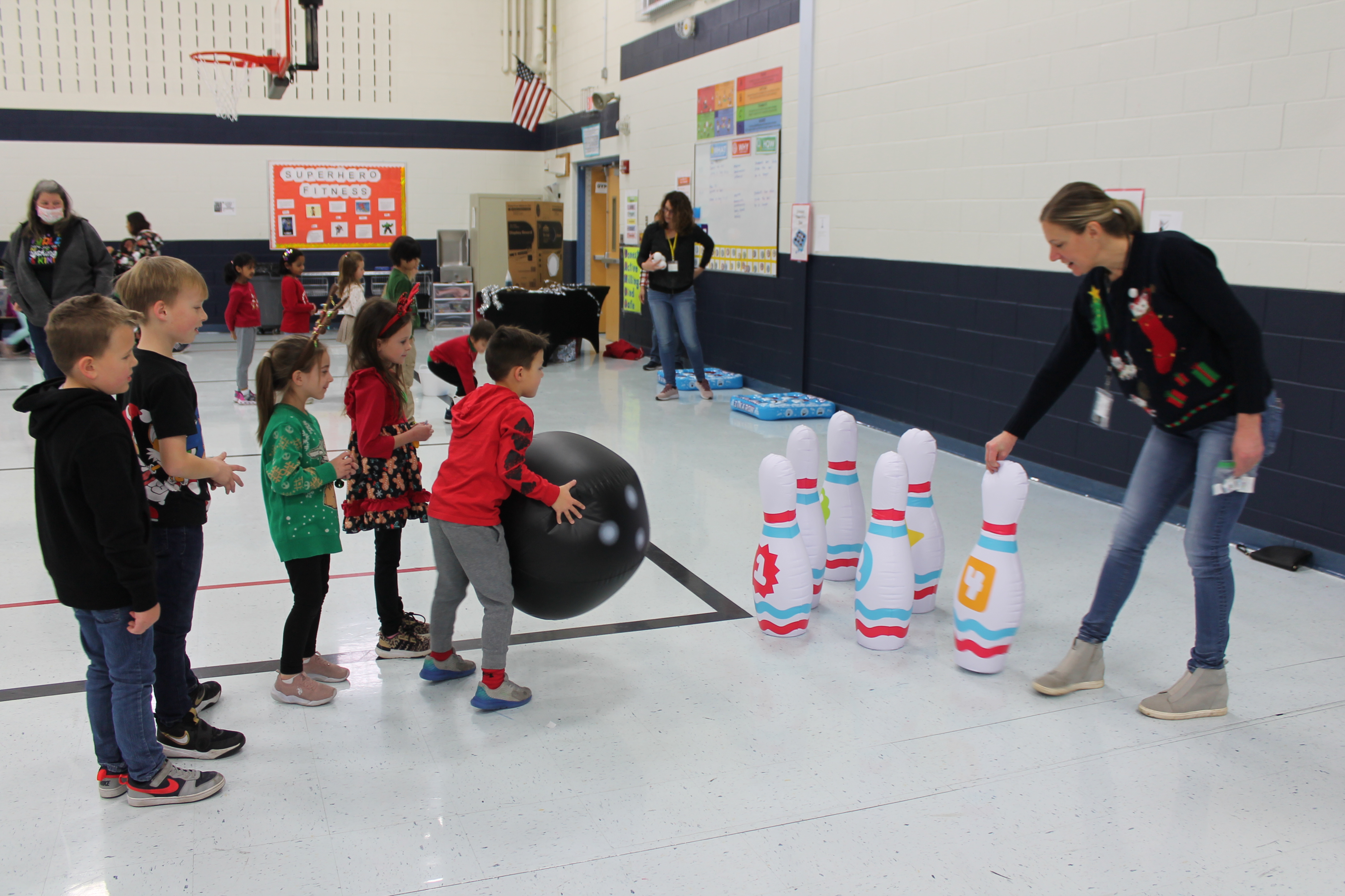 Students enjoy holiday games and crafts at winter-themed parties.