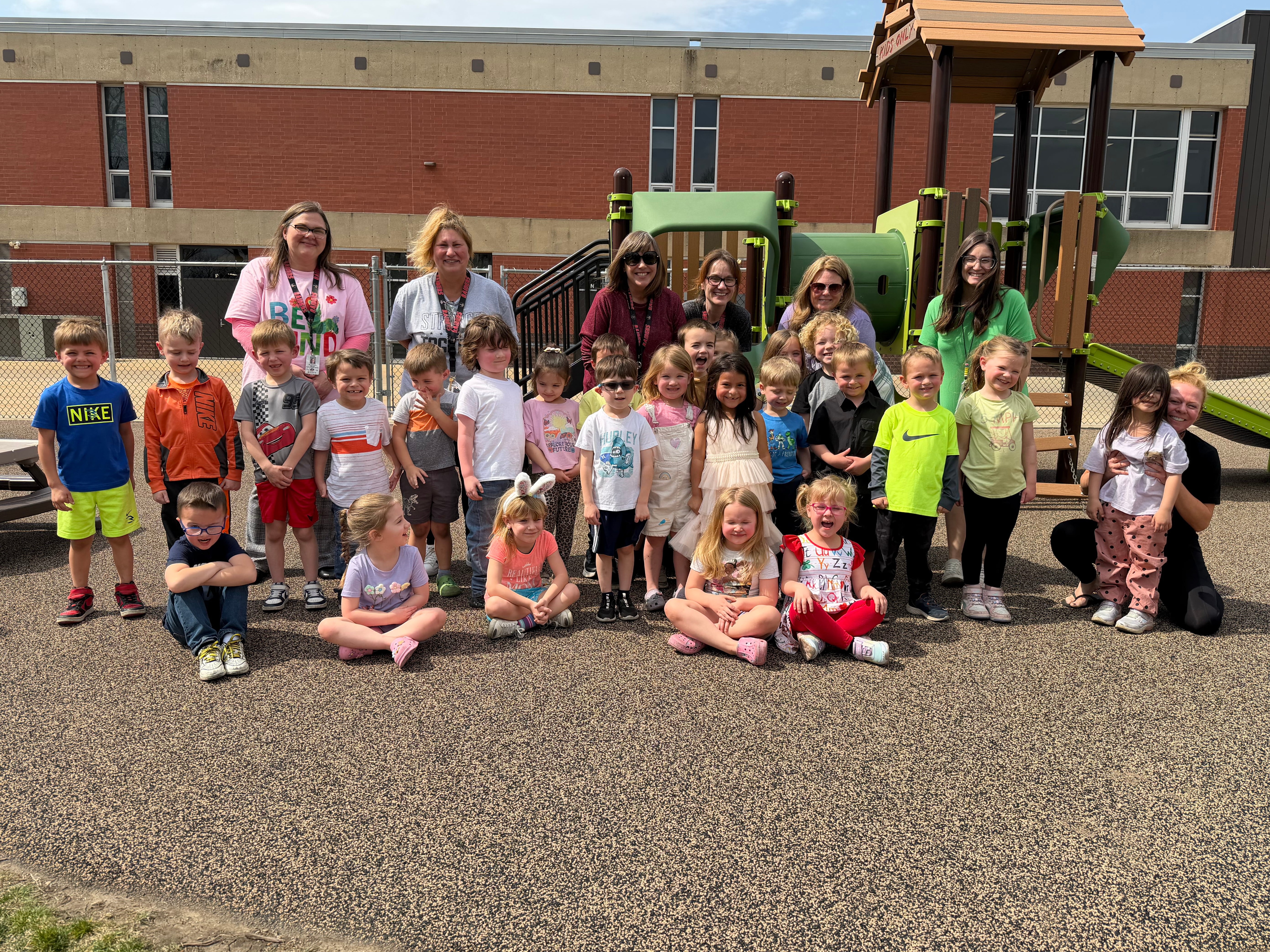 kid smiling on the playground