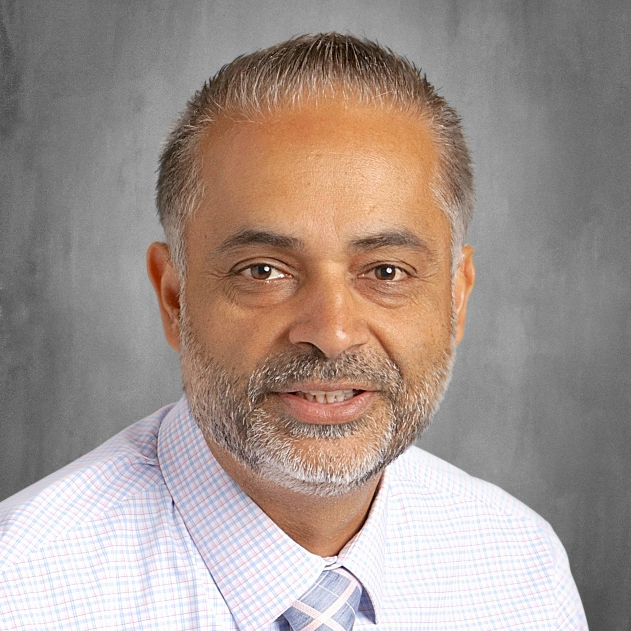 headshot of AJ Hundal