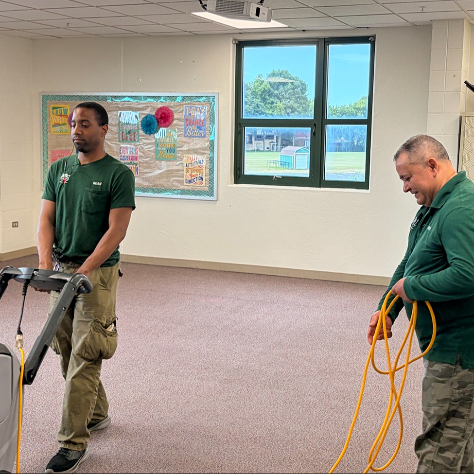 PHS Custodians cleaning carpets
