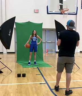 Basketball player being photographed