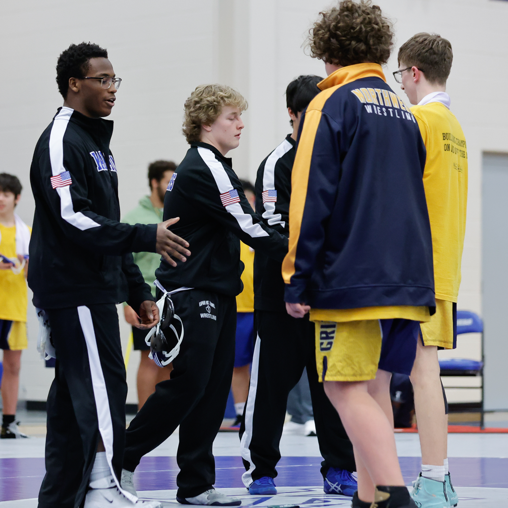 KMC captains shake hands before meet