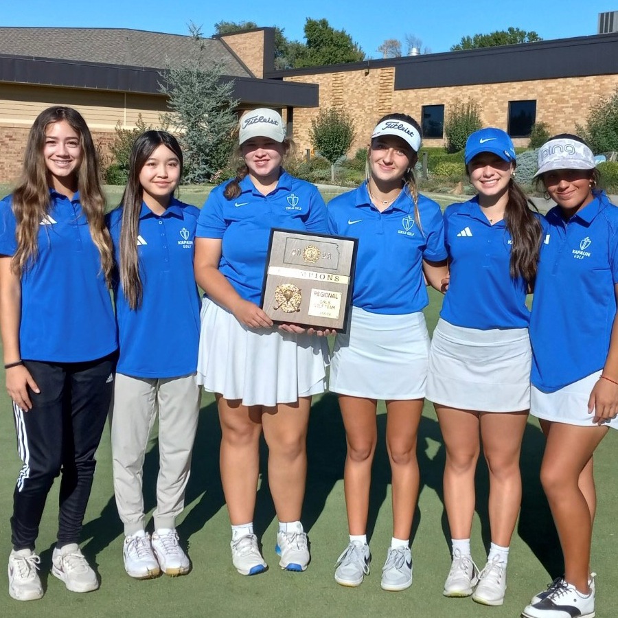 Girls team poses with regional plaque