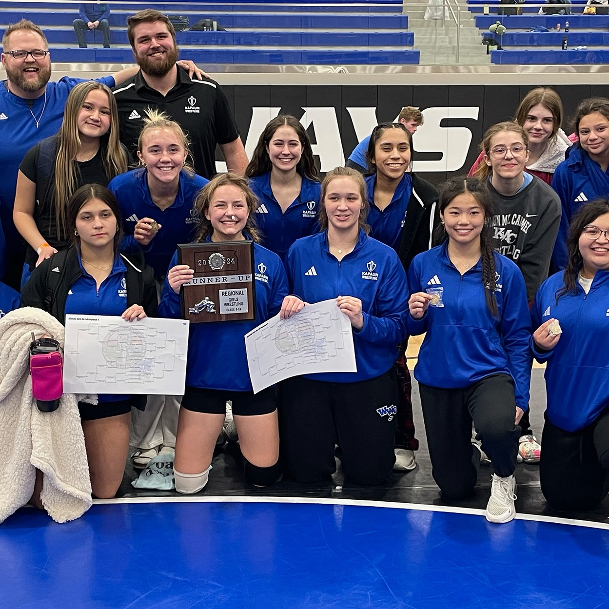 Girls wrestling team poses for a team picture