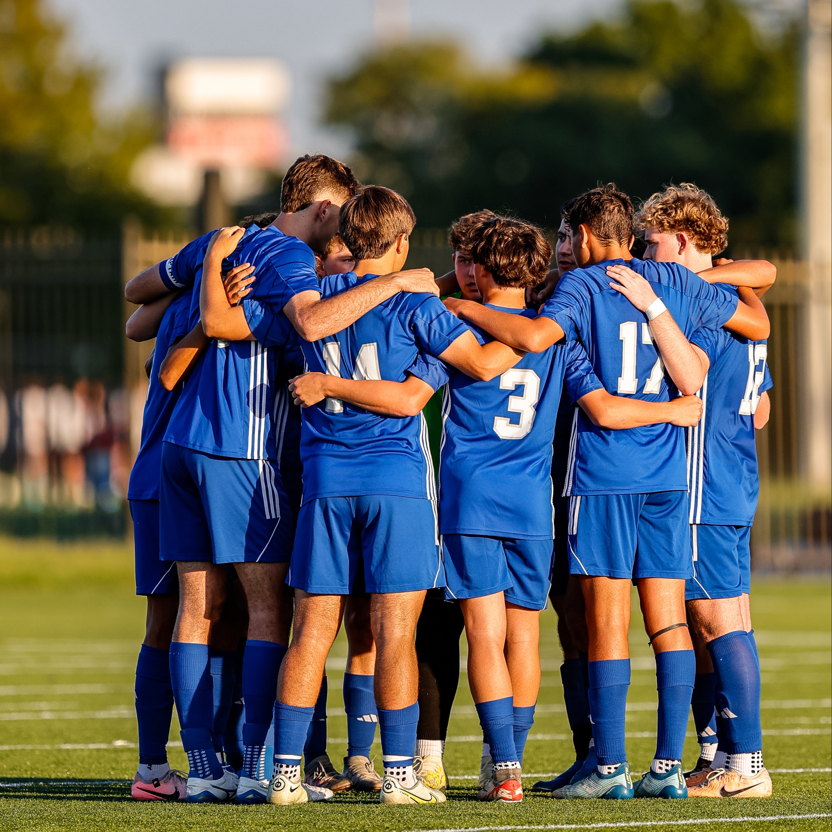 Soccer team huddle