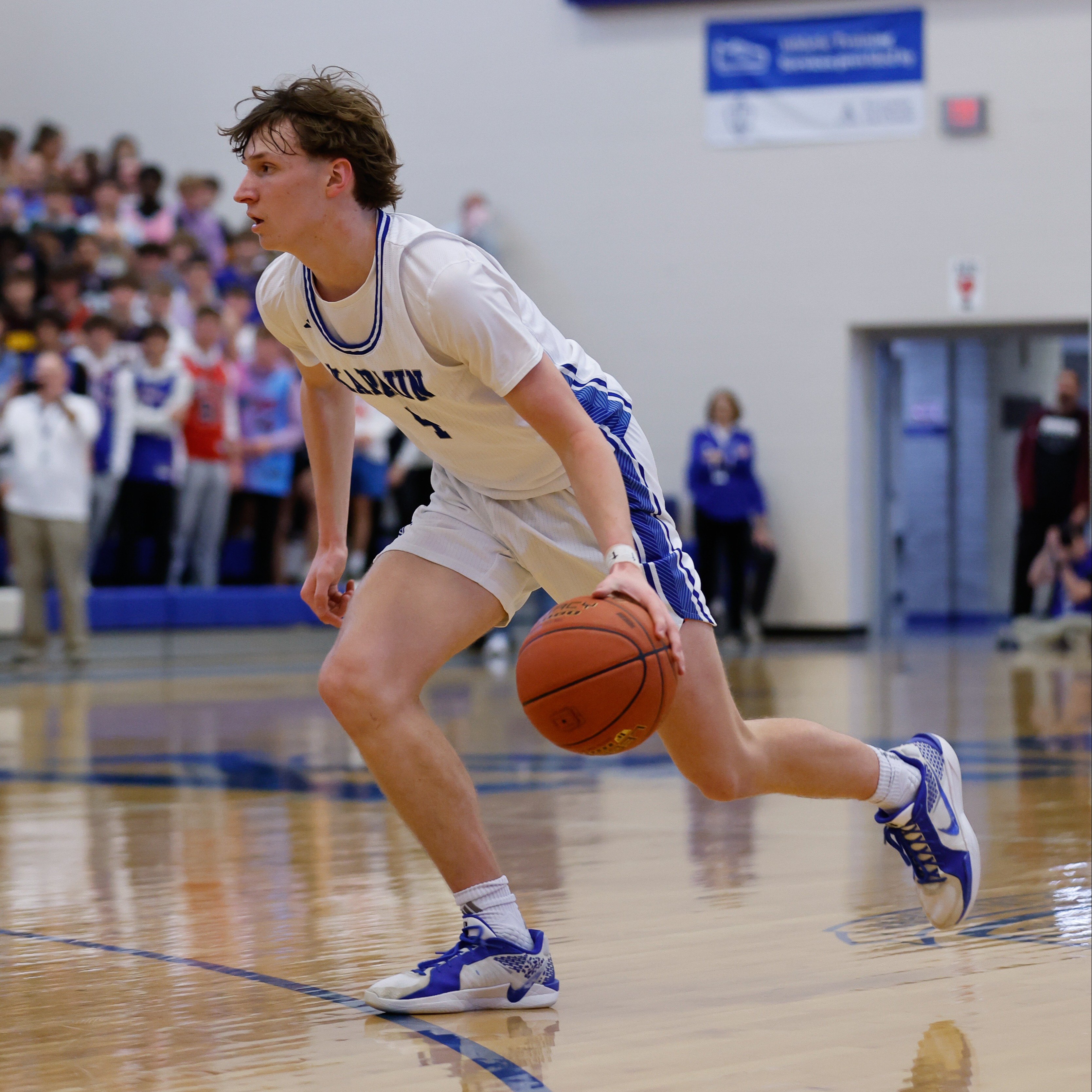 Boys Basketball Player Dribbling Ball