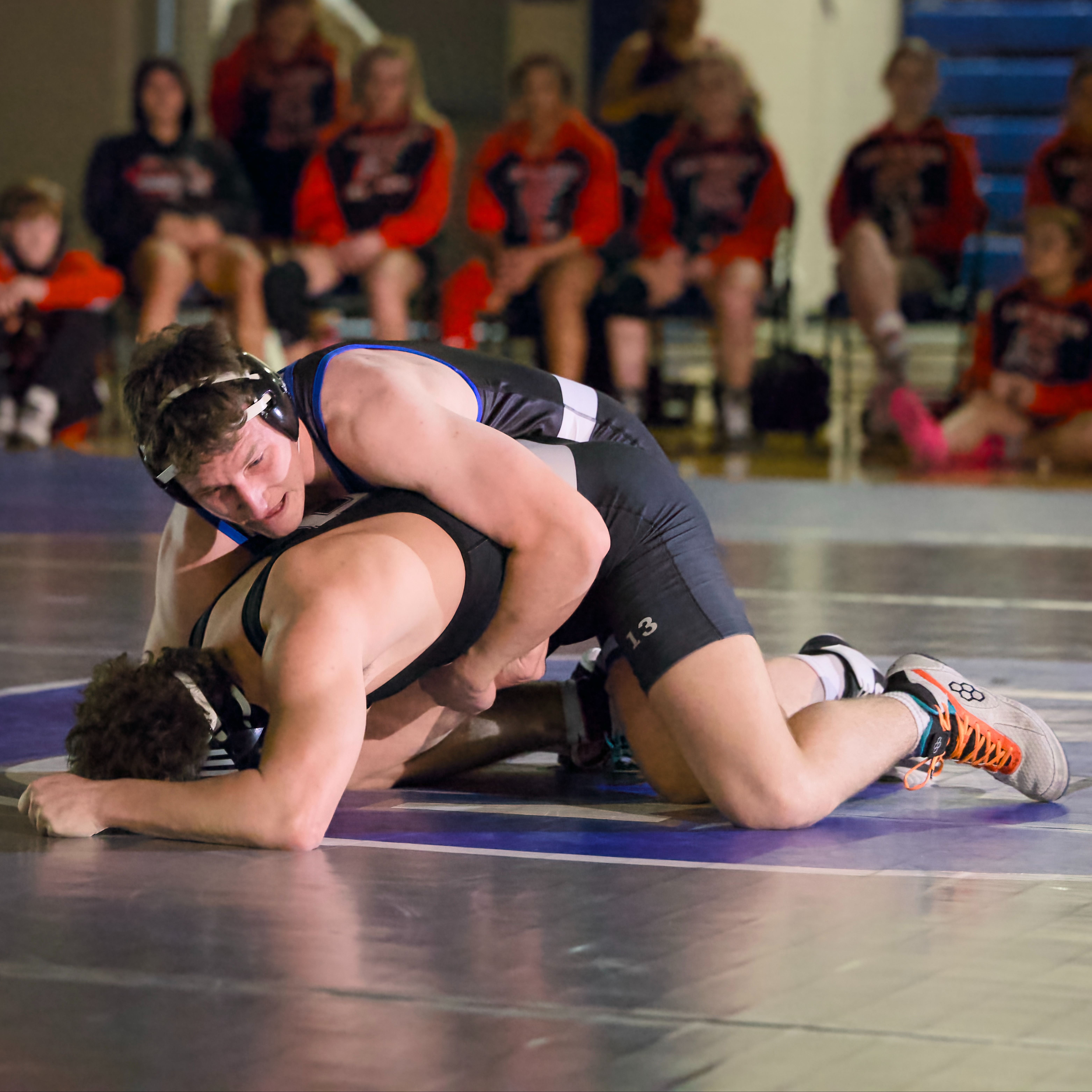 Julio Traglia takes down another wrestler