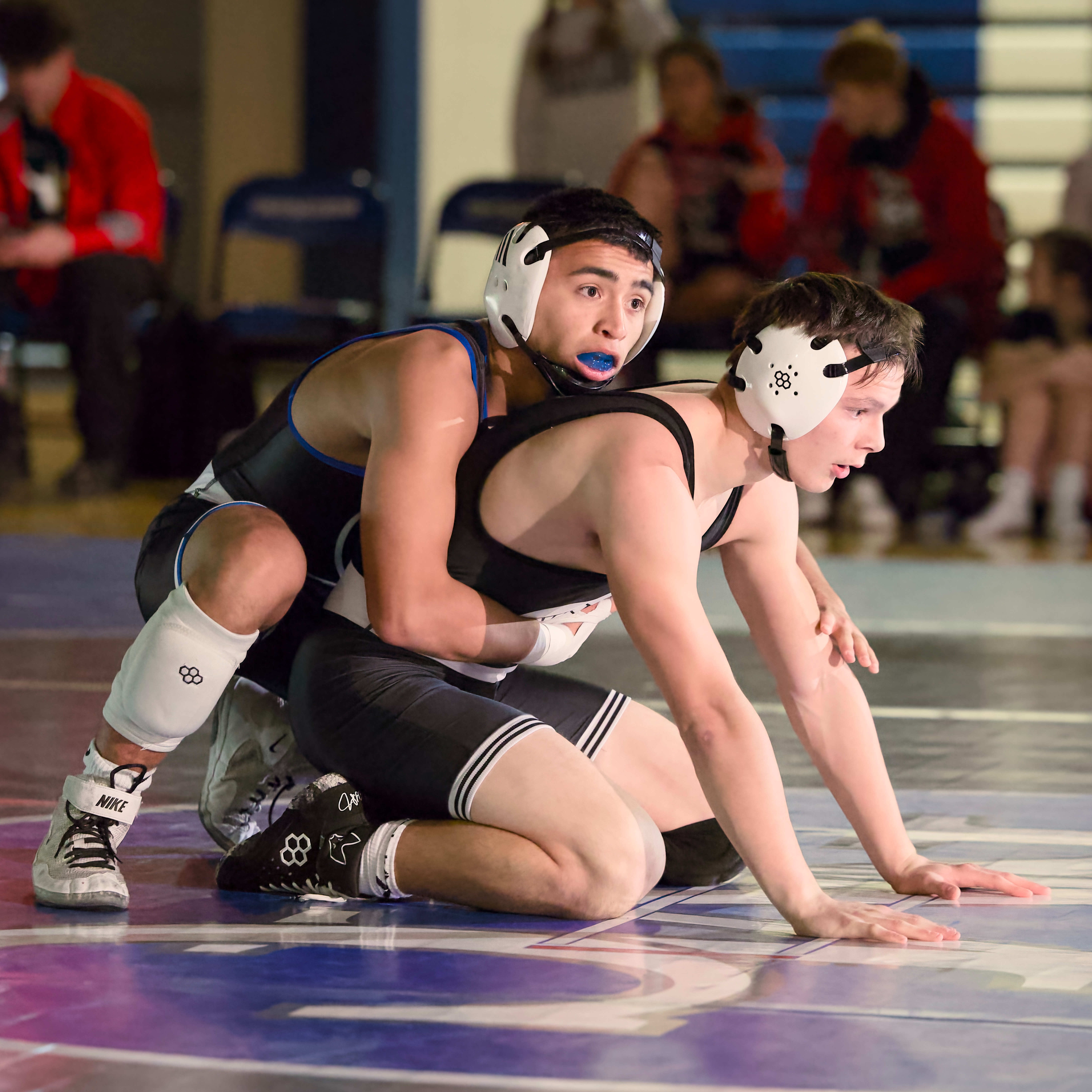 Bennett Lerch attempting to pin opponent