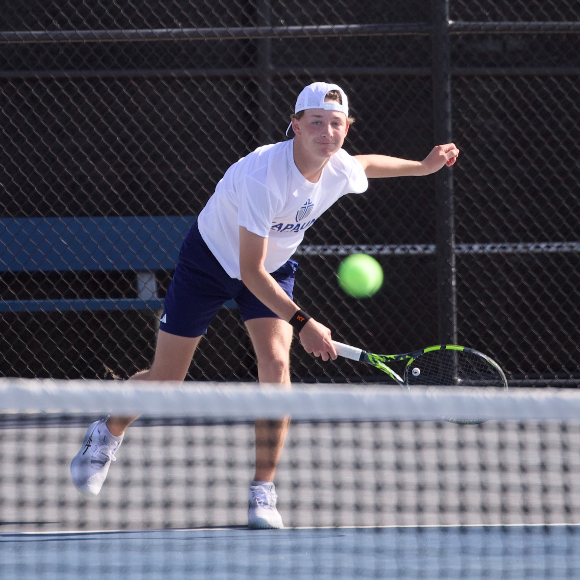 Jude Simon serves ball