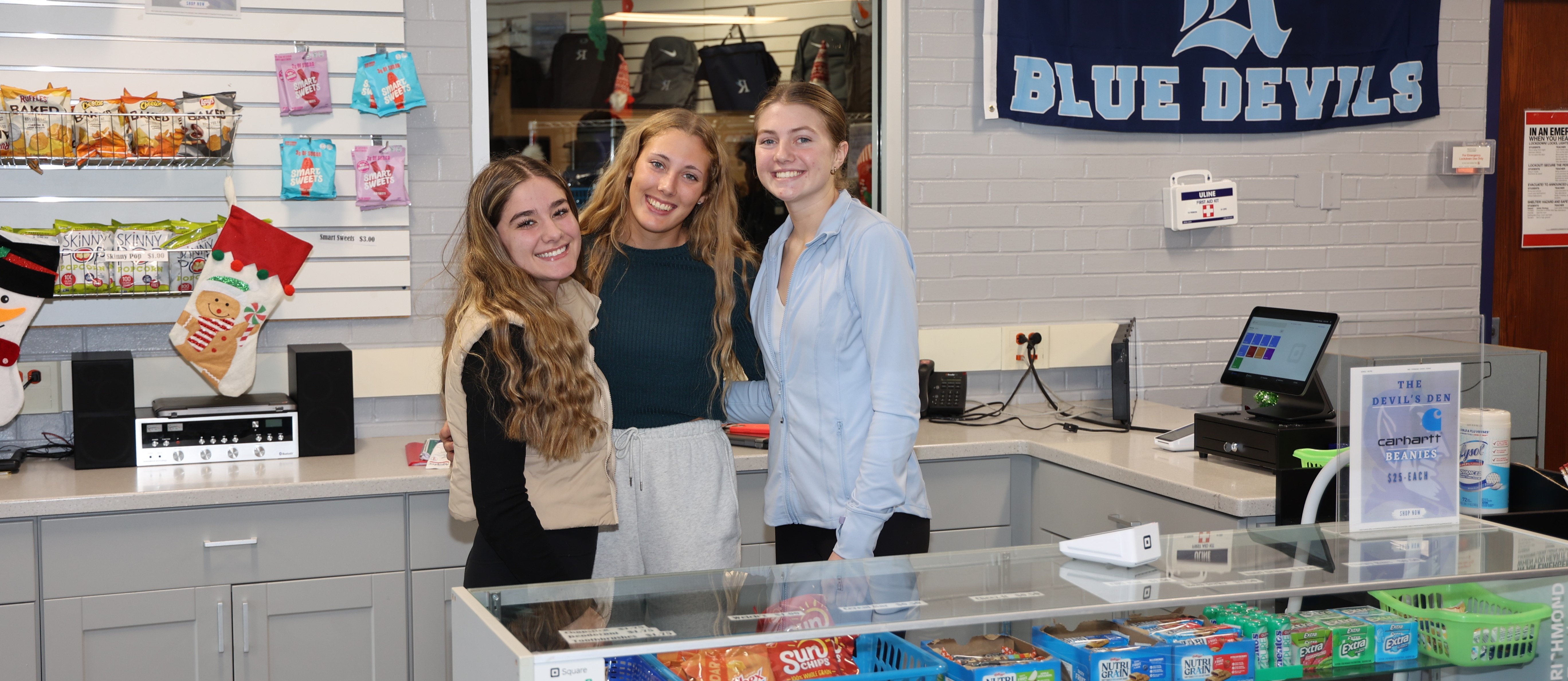  students working at the snack shop